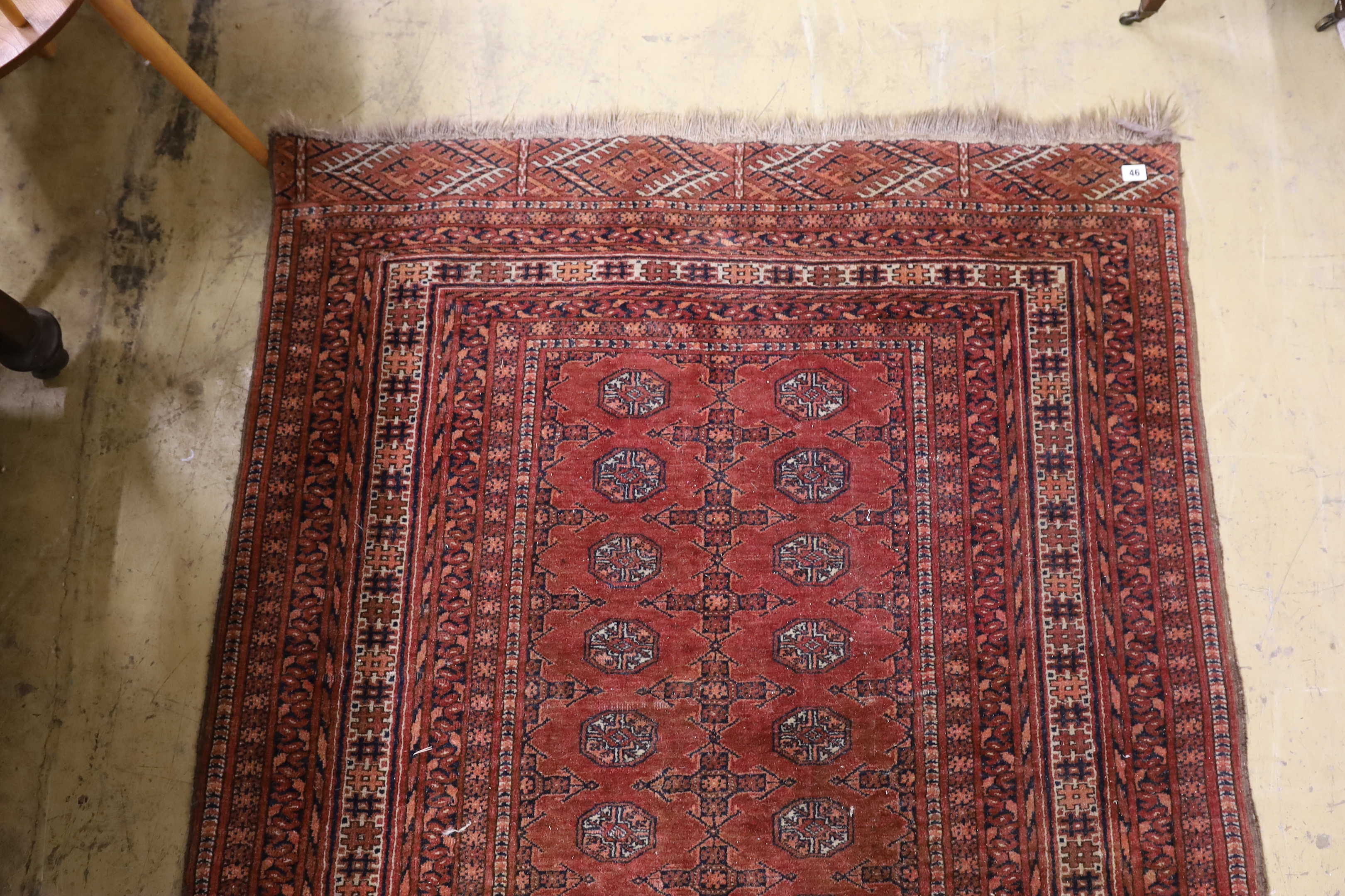 A Bokhara red ground rug, 158 x 124cm
